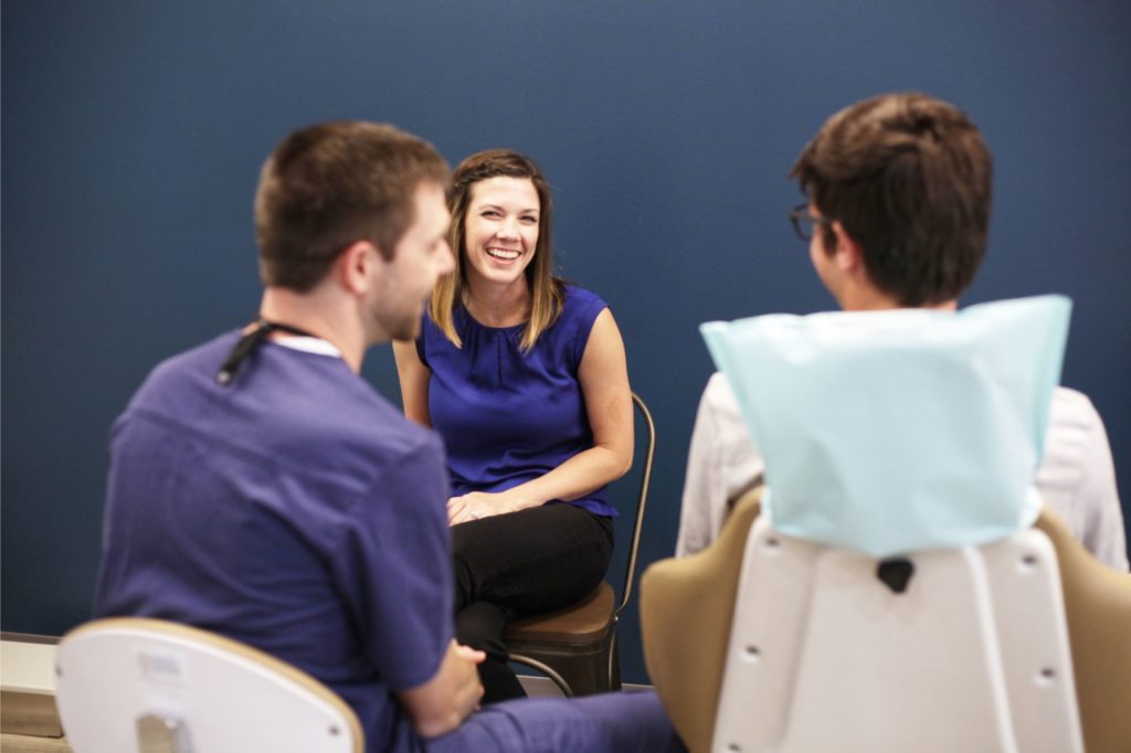 Here at Hemphill Orthodontics, we want you to feel informed and empowered from your first visit with us to the last. We know that choosing to improve your oral health with orthodontic treatment is a big decision, and since you only get one smile, you shouldn’t trust it to anyone other than an experienced orthodontist! But what if you’re not sure how to go about finding one? To help get you started on your orthodontic journey, our talented team has put together this list of important questions to ask any orthodontist you’re considering, in order to make an informed decision on your care. Let’s take a closer look at what you should know before committing to a particular practice! Is the doctor a trained orthodontic specialist? This is actually the most important question you can ask when exploring treatment with braces or clear aligners. That’s because some general dentists are also able to provide orthodontic treatment, even though they don’t specialize in it. A general dentist will offer common dental services like crowns, fillings, dentures, and occasional orthodontic treatment like Invisalign. An orthodontist, on the other hand, spends their days providing only orthodontic services. This distinction is pretty important. For instance, imagine that you or your child required specialized treatment or surgery. Would you feel comfortable with your family physician handling your case, or would you prefer a dedicated specialist? Orthodontists are essentially dentists who also have several years of additional specialized training and experience. This means an orthodontist has: studied the growth and maturation of the teeth and jaws been introduced to thousands of case studies Researched all the latest advancement in technology and methods developed extensive diagnostic skills learned biomechanical techniques to properly move teeth studied how to change the development of the dental alveolar complex and facial growth of younger patients To give you an idea of how competitive orthodontic residency programs are, they only accept the top students in any dental school graduating class! These orthodontic programs last 2-3 years, and include full-time training that focuses on correcting orthodontic issues with braces and aligners. While there are exceptions to every rule, most dentists won’t possess this same level of exhaustive orthodontic training and experience. Dr. Blake Hemphill earned a bachelor’s in Spanish from Harding University, where he played tennis as an Intercollegiate Tennis Association Scholar. He then attended Texas A&M University Baylor College of Dentistry and graduated with a Doctor of Dental Surgery. To top it all off, he graduated as the class VALEDICTORIAN from Saint Louis University’s Center for Advanced Dental Education with a Certificate of Orthodontics and a Master of Science in Orthodontics. Dr. Hemphill is a member of the American Association of Orthodontists, and has received the following awards, distinctions, and recognitions: Odontological Honor Society Omicron Kappa Upsilon Honor Dental Society Cumulative Dean’s Honor List at Baylor College of Dentistry American Association of Oral Biologists Award American Academy of Oral Medicine Award What treatment options does the orthodontist offer? Hemphill Orthodontics has a wide variety of treatment options available to patients of all ages in Celina and the surrounding communities. Metal braces Traditional metal braces are still the most widely used orthodontic appliance, and have come a long way in recent years! They are typically made of a mix of high-grade stainless steel, nickel, and other durable metals. Bands that wrap around the back molars are sometimes used, and smaller metal brackets are cemented to the front surfaces of the other teeth. There is also a thin, springy metal wire that connects the braces, tied into the brackets by colorful elastics, metal ties, or another type of clasp. All of these components come together to gently guide your teeth into the desired positions over time. Clear braces Sometimes called ceramic braces, these function in the same way metal braces do, but are made of clear materials instead of stainless steel. Because they are less visible than traditional braces, they’re popular with older teens and adult patients who may be more image-conscious and looking for a more esthetic treatment option. They are larger and more brittle than their metal counterparts, so we tend to use them on the upper front teeth more often than the lower teeth. Invisalign The Invisalign system is made up of a series of customized aligners that are nearly invisible and completely removable. Unlike traditional braces, no brackets and wires are needed to move the teeth! This offers patients a measure of freedom and flexibility that traditional braces just can’t beat. Designed to fit snugly but comfortably over your own teeth, Invisalign provides a more subtle and comfortable orthodontic experience. When worn the recommended 20-22 hours per day, and changed out weekly to progress in the series, these aligners will gradually move your teeth into proper position. Invisalign Teen Although Invisalign and Invisalign Teen work the same way when it comes to the underlying technology, Invisalign Teen was developed with the unique needs of teen patients in mind. There are a few special features that are specific to the Invisalign Teen system, including the following: Compliance indicators To help teens stick to their treatment plan, Invisalign Teen has a compliance indicator incorporated into each aligner. This will fade from blue to clear as it is used, providing a visual approximation of wear. This lets patients, parents, and orthodontists keep track of patient use. If a teen is skipping out on hours, it will be noticeable in enough time for us to correct compliance, thus keeping the overall process moving along at the right pace. Eruption tabs This feature accommodates the growth of the second molars in young adults, helping to keep space open for unerupted teeth and making it possible to treat a wider range of conditions with Invisalign. Replacement aligners We all lose or damage things from time to time. While we encourage all of our Invisalign patients to be careful with their aligners, teens don’t need to worry about misplacing or losing one. Invisalign Teen anticipates it happening, and provides up to six replacement aligners at no charge, just in case! How frequent are follow-up visits with the orthodontist? Whatever treatment option you choose with Dr. Hemphilll, you should expect regular monitoring visits to our Celina office. For most patients, adjustment appointments will be scheduled every 4-8 weeks or so. During these visits, Dr. Hemphill will replace any worn-out rubber bands, check the progress your teeth are making, and make adjustments to the appliances to ensure that the teeth are moving in the right direction. Invisalign patients may come in less often, but these appointments are still an essential part of the orthodontic process, so you don’t want to miss them! Depending on case difficulty, treatment time varies greatly, ranging anywhere from 6-36 months. Regardless of your total estimated time, you’ll be seeing us often throughout your orthodontic journey! We know how busy today’s families are, so we never overbook patients and always aim to see you at your scheduled time. Don’t trust your smile to anything less than the best! If you’re looking for the best in high-quality orthodontic care, Dr. Hemphill has the education, skills, and expertise necessary to create a beautiful smile with long-lasting results. If you’re ready to take the first step in your orthodontic journey, we would love to meet you and talk more about how we can help you achieve the smile you desire. There’s never been a better time to take the first step towards improved oral health, so get in touch today to schedule your FREE consultation with Dr. Hemphill!