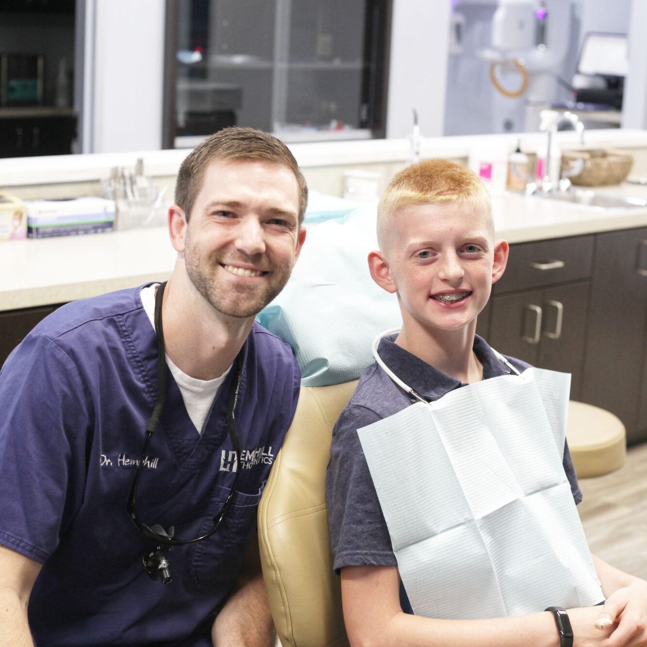 Dr. Hemphill with a young patient