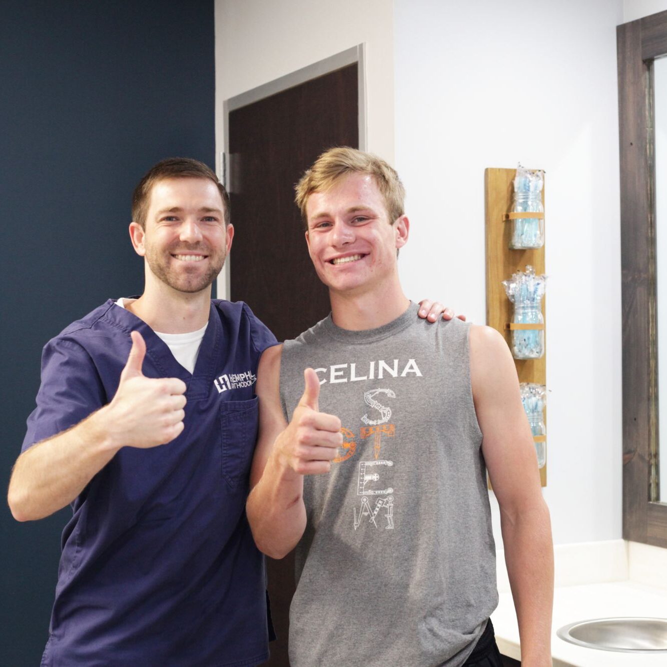 Dr. Hemphill with a teen patient